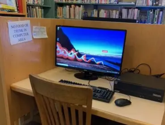 hand holding a library card